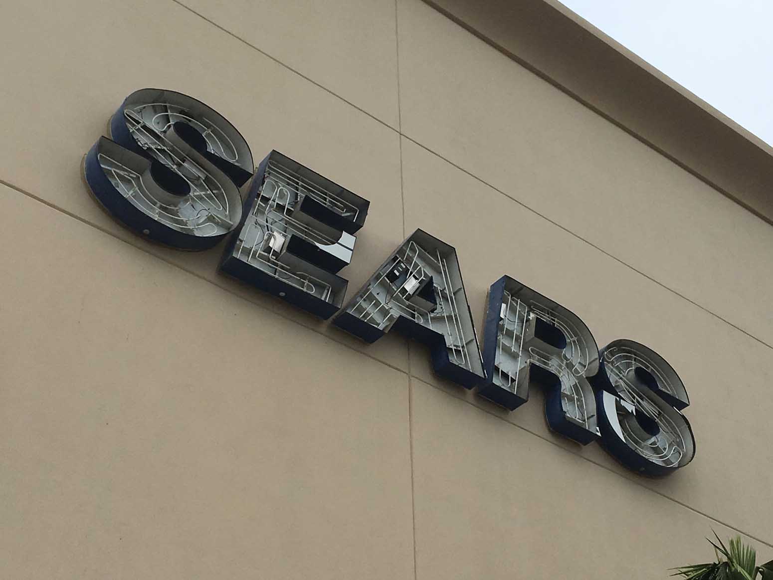 The damaged Sears sign at Plaza Las Americas